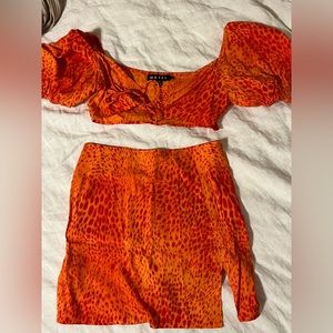 Motel Rocks brand new two piece set with leg slit